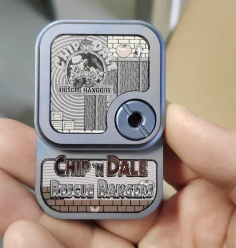 

Squirrel side push titanium blue EDC decompression toy