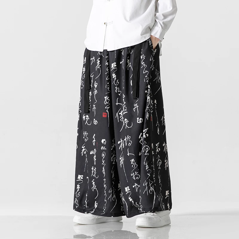 2023 nuovo stile cinese Casual Vintage stampa pantaloni a gamba larga uomo Kung Fu Harem pantaloni uomo Baggy Hanfu gonne pantaloni