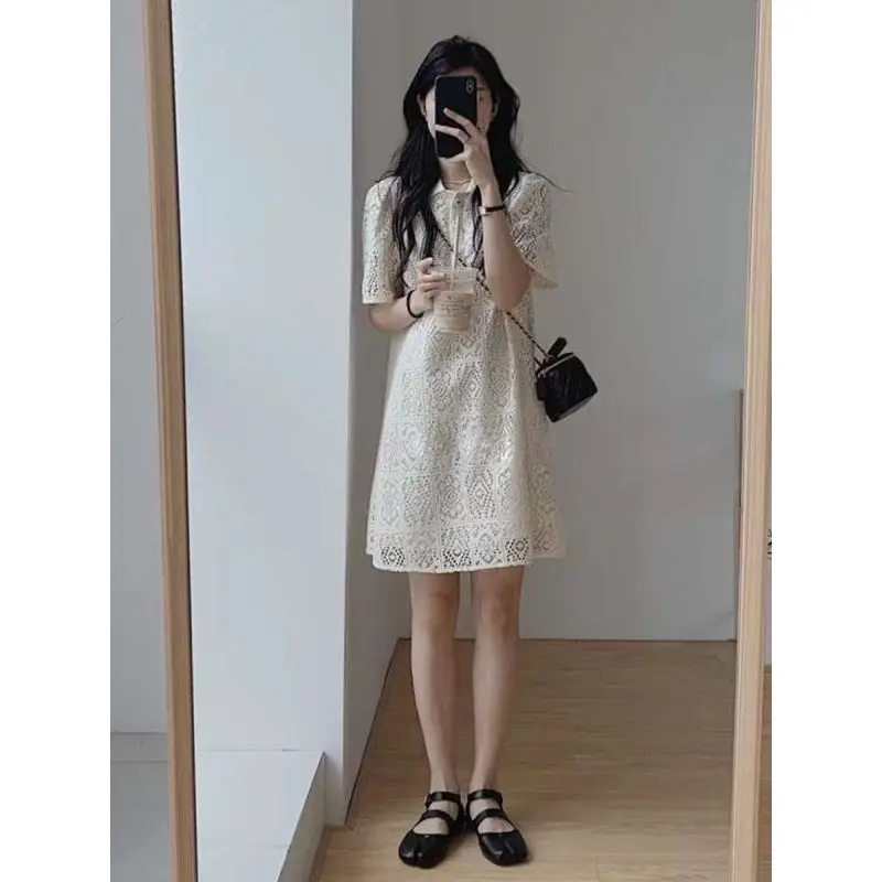 2024 New Summer Niche High-end Design Sense Hollowed Out Jacquard Fashion Casual Loose Commuting Minimalist Polo Neck Dress