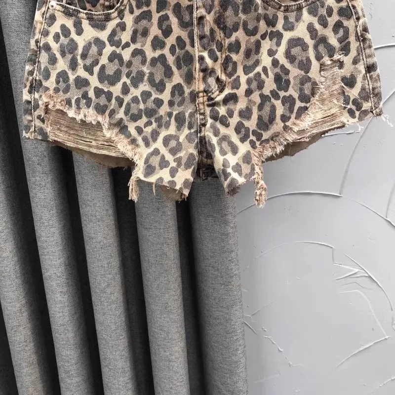 Pantalones cortos vaqueros de cintura alta con estampado de leopardo personalizados, moda de verano para mujer, pantalones vaqueros de pierna ancha con borde áspero, pantalones calientes