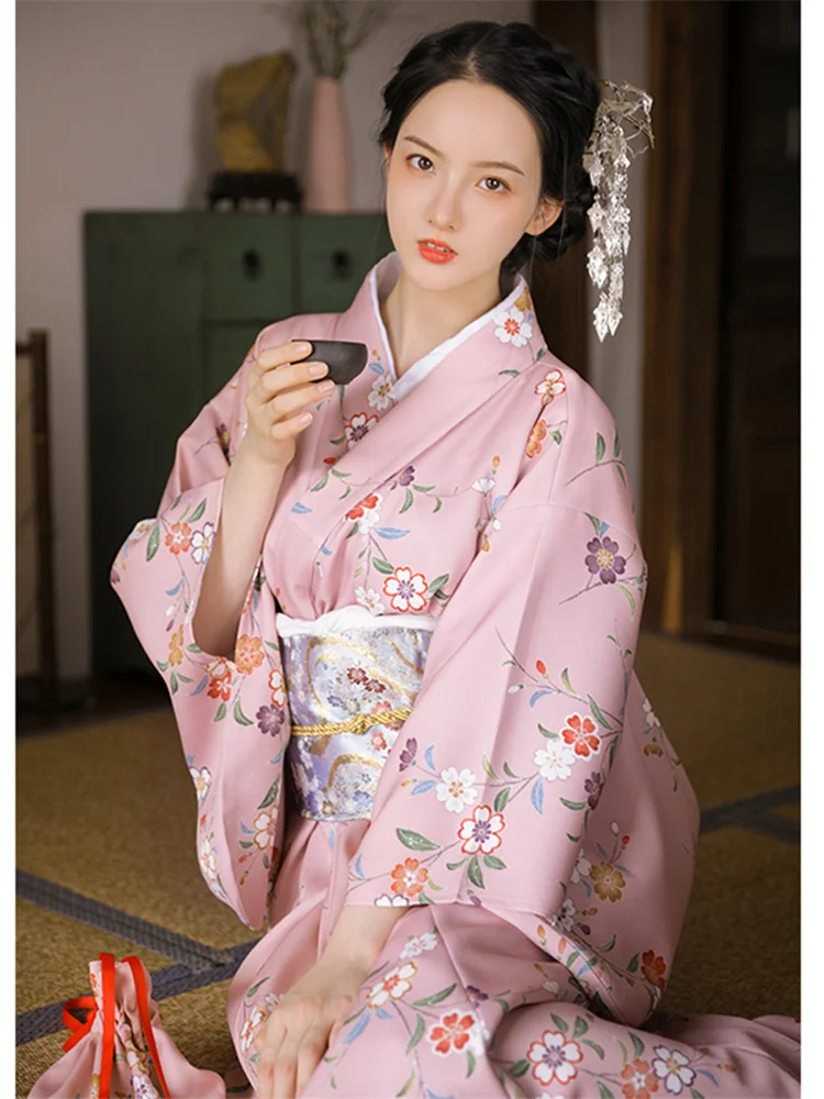 Japonia styl damska długa sukienka tradycyjne Kimono różowy kolor kwieciste wydruki formalne Yukata ubrania Cosplay fotografia sukienka