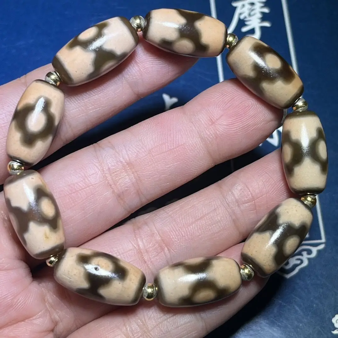 Tibetan high-oil pulp three-eye dzi bead bracelet [currency] Size: 19 * 10mm * 9 pieces