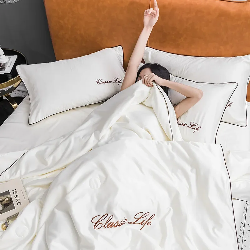 

Light luxury washed ice silk summer cool quilt 4 piece set solid color embroidered Tencel summer quilt bed sheet mattress model