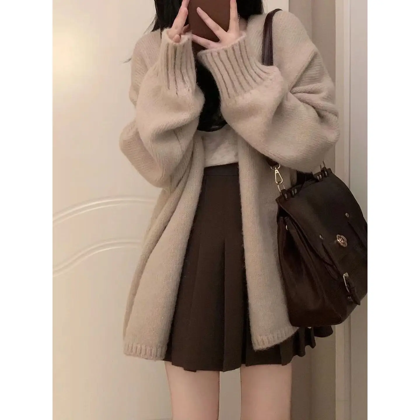 Spring Wear Female 2023 New Korean Version of The Hundred with Suspenders Loose Cardigan Thin Pleated Skirt Three-piece Set