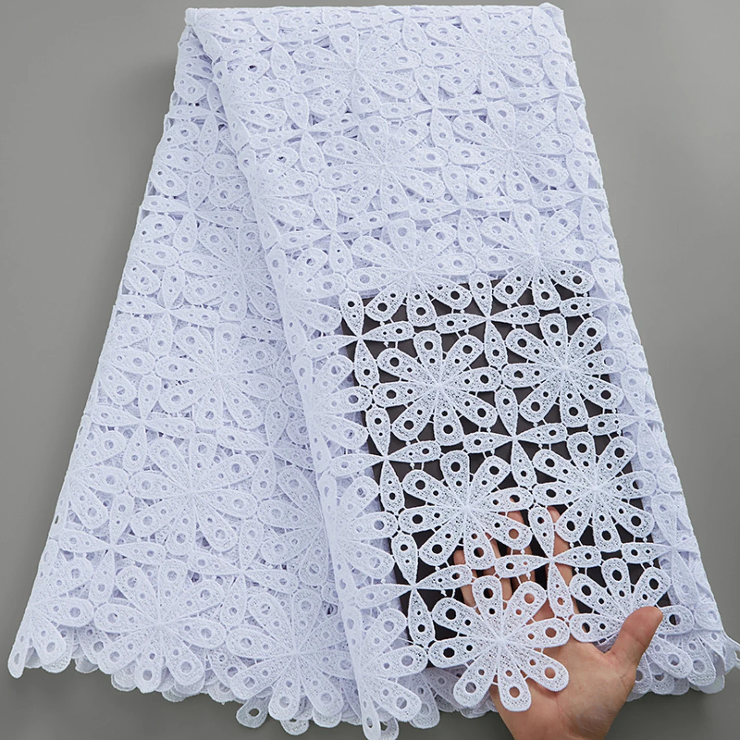 High Quality, Elegant and Sophisticated African Guipure Cord Lace Fabric in Luxurious White with Delicate Embroidery Detail. Per