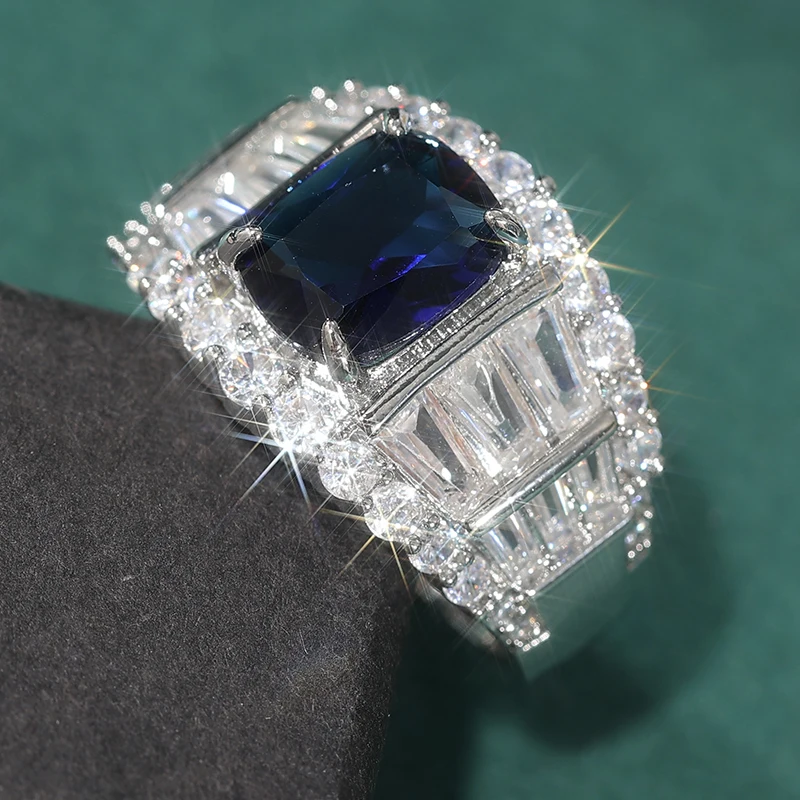 Eleganter Damen-Verlobungsring aus Kupfer, handgefertigt mit eingelegtem blauem Zirkon, glänzender Ring, luxuriöses Mode-Schmuckstück.