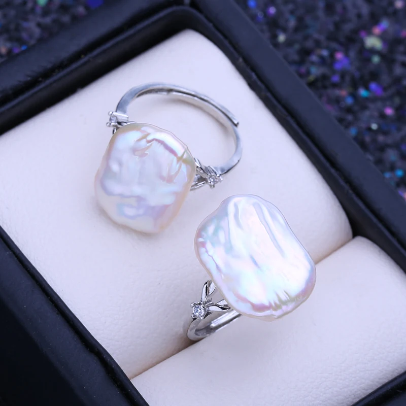 

Женское свадебное украшение: серебряное кольцо с натуральным пресноводным барочным жемчугом