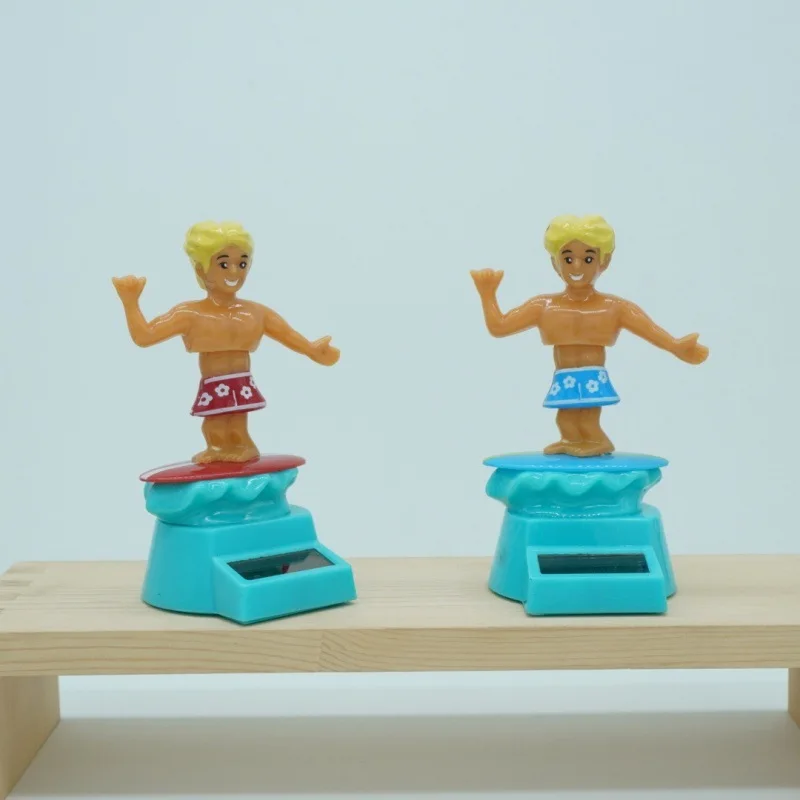 Creative Summer Beach Surfing Muscle Boys Solar Toys Funny Swinging Dancing Boy Car Decoration Ornament Children Solar Toy
