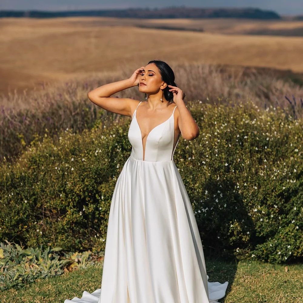 2025 Satin Wedding Dresses Deep V Neck A Line Backless Sexy Spaghetti Strap Bridal Gown Outdoor Women Bride Dress Customized