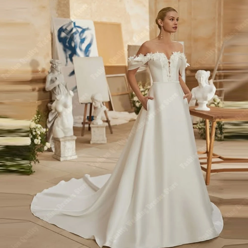 ลูกไม้ที่สวยงามพิมพ์ผู้หญิงชุดแต่งงานเซ็กซี่แขนกุดชุดเจ้าสาววินเทจส่องแสงรูปลอกออกแบบเดรส เดอ โนเวียที่กำหนดเอง