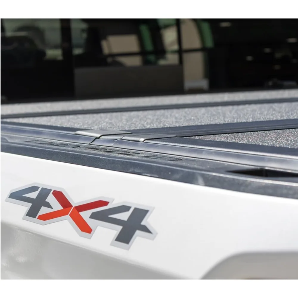 غطاء شاحنة صلب منخفض الطي ثلاثي الطي قابل للطي لسرير تونيو 2019-2025 تشيفي سيلفرادو/جي إم سي سييرا 5 بوصة 8 بوصة (69.6 بوصة)