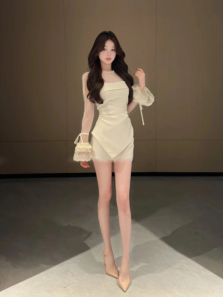 Inverno Nuovo Design Vedere Attraverso Maglia Nera T-shirt a maniche lunghe Donna Y2k Irregolare Slim Fit Magliette e camicette Francese Dolce Elegante Chic Abiti