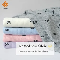 Tessuto jacquard con stampa bowknot Tessuto a costine in maglia elasticizzata per cucire abito cardigan Autunno Inverno Panno da donna Pantaloni per bambini Tessuto