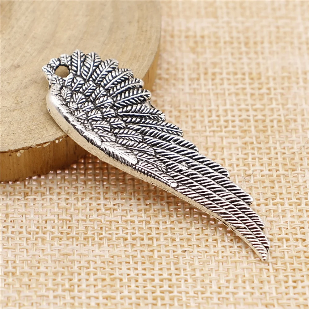 

Wholesale 60pcs/bag 50x17mm Charms Wholesale Angel Wings Antique Making Pendant Fit Tibetan Silver Color DIY Handmade Jewelry