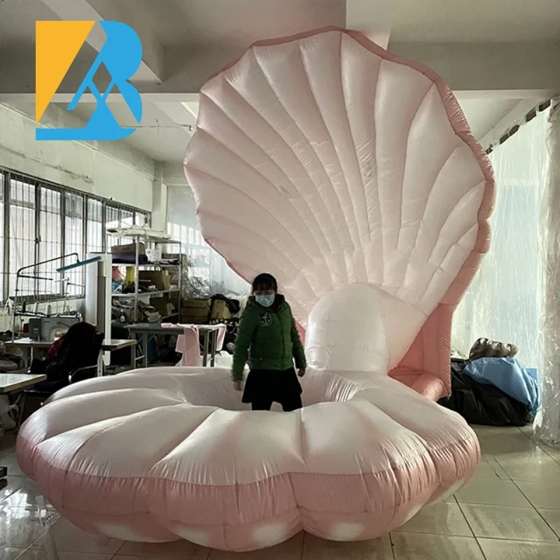 La grande festa a tema Royal Ball personalizzata illumina il guscio gonfiabile del mare per i giocattoli decorativi dell'ingresso sul palco