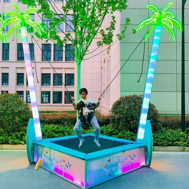 Outdoor bungee trampoline with Light Emitting Diode and safety net for children's playground equipment in theme parks