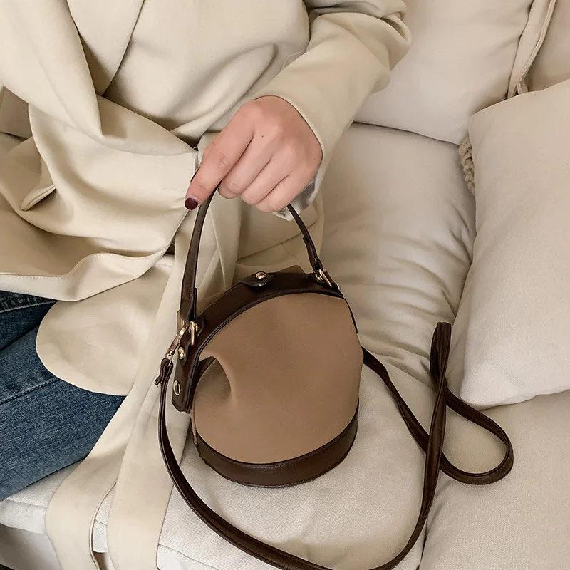 El mini bolso pequeño femenino 2025 nueva moda de primavera y verano bolso de hombro esmerilado de mano Yangqi bolsos cruzados tipo cubo