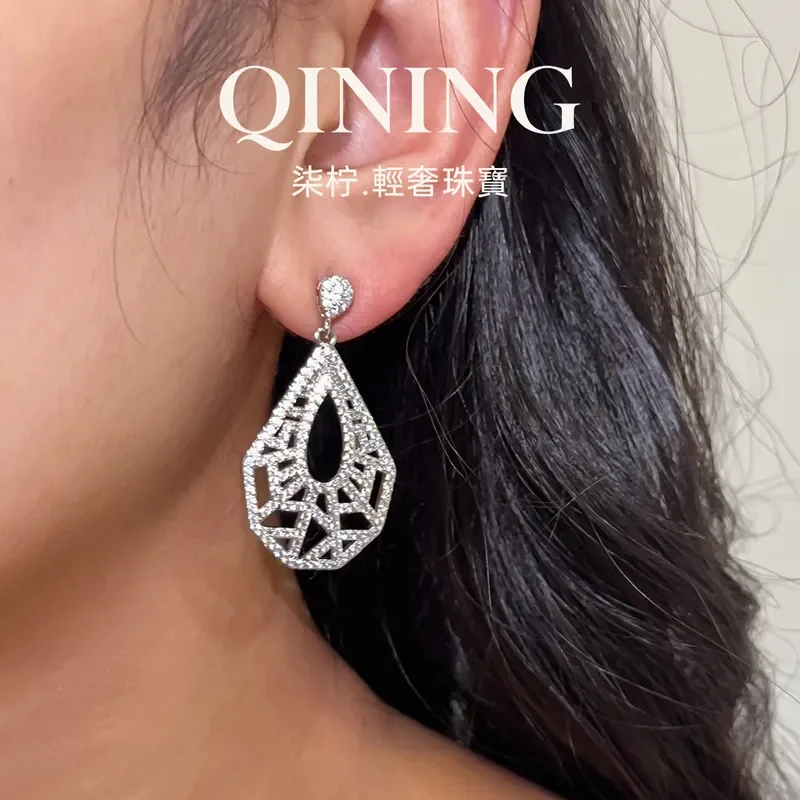 Alps snow light silver hollow water drop earrings French light luxury temperament stud earrings commuter cold high-end