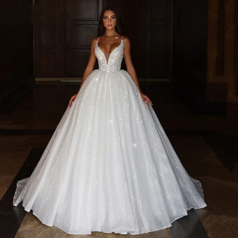 

Customized Charming sexy A-Line Wedding Dresses Seequins Spaghetti Strap Bride Dresses Backless V-Neck Wedding Gown For Women