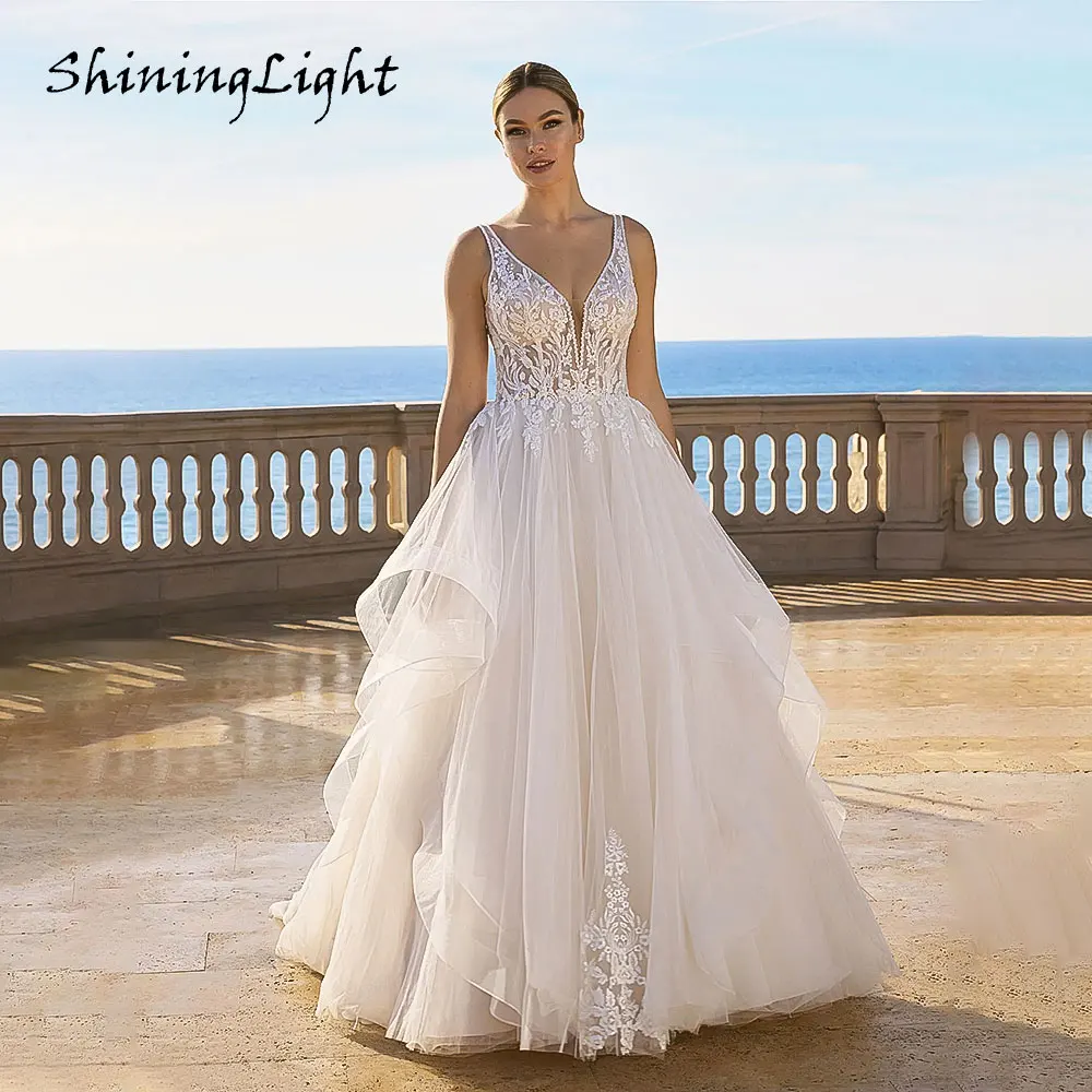 

ShiningLight Sexy V-Neck Bride A-Line Wedding Dress 2026 Appliques Lace Princess Boho Bridal Gowns vestidos de novia Customized