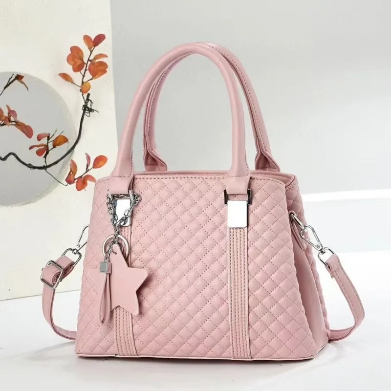 ユニークでクラシックなエレガントなおむつバッグ：女性用クロスボディメッセンジャーバッグ、大容量でパリデザインのデザイナートートバッグ