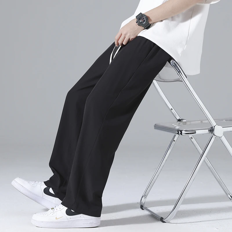 Brand Men's Loose Fitting Casual Pants Korean Fashion Baggy Straight Leg Wide Leg Ice Silk Pants Summer Large Jogging Pants 4XL