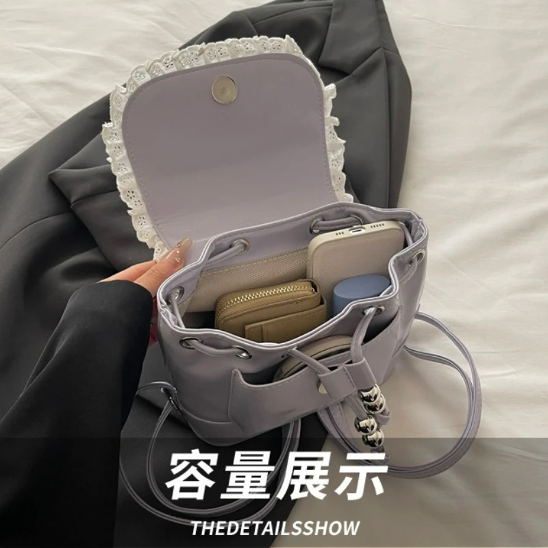 حقيبة ظهر نسائية كرتونية بسيطة للترفيه حقيبة مدرسية على طراز الباليه حقيبة دلو صغيرة مريحة ومتعددة الاستخدامات مع دانتيل على شكل فيونكة