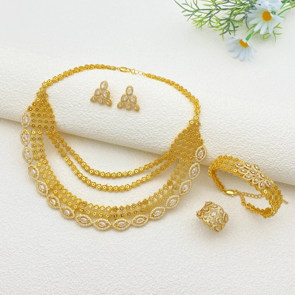 

Комплект украшений Flora: винтажные позолоченные медные браслет, кольцо, ожерелье и серьги с искусственными цирконами. Легкая роскошь. Коллекция женских ювелирных изделий.