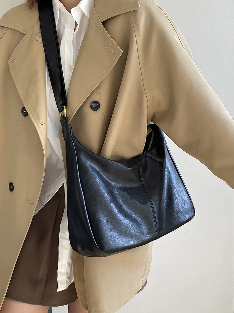 

Большие черные кожаные сумки для женщин, новинка 2025 года, минималистичная универсальная сумка через плечо для девочек большой вместимости