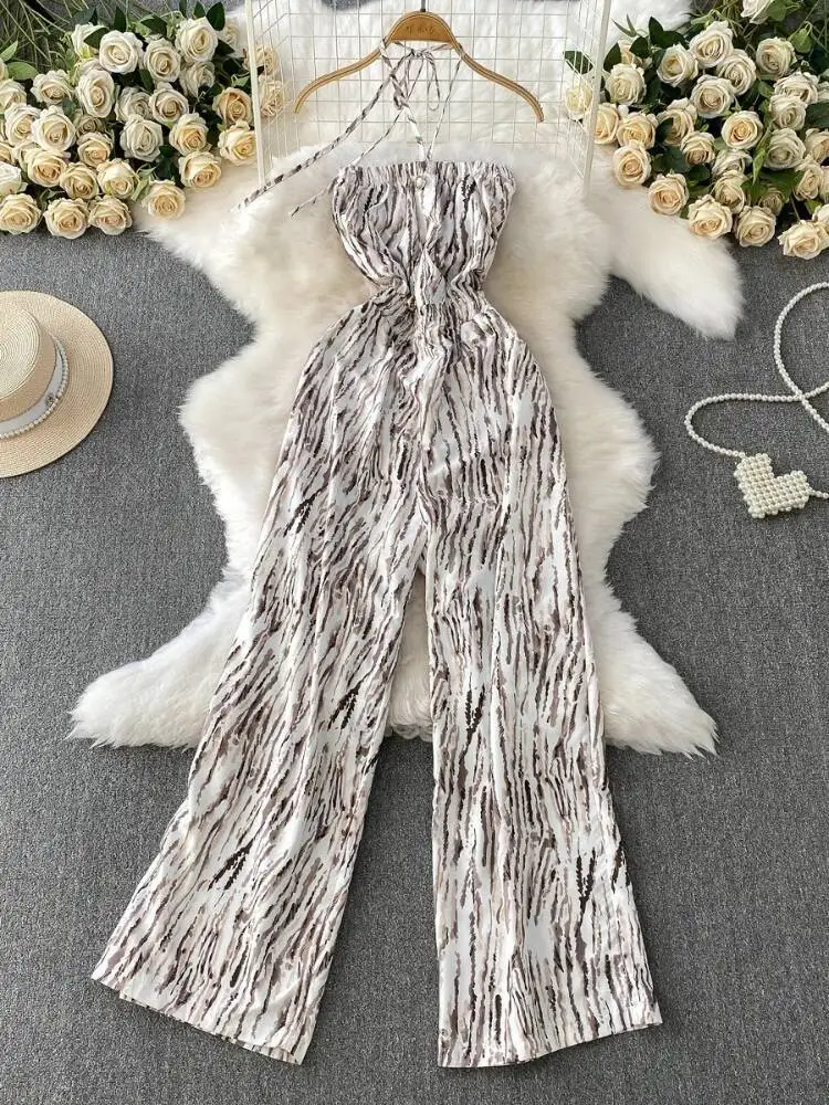 夏のセクシーなジャンプスーツ女性プリント胸ラップぶら下げネックストリートジャンプスーツ女性ストレートレッグワイドレッグパンツロンパース