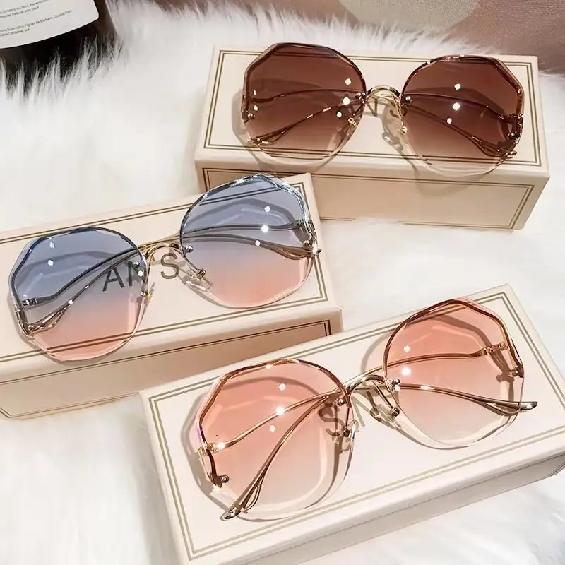 

2024 Luxury Round Gradient Sunglasses Women Metal Curved Temples Eyewear Ocean Rimless Fashion Sun Glasses Ladies UV400