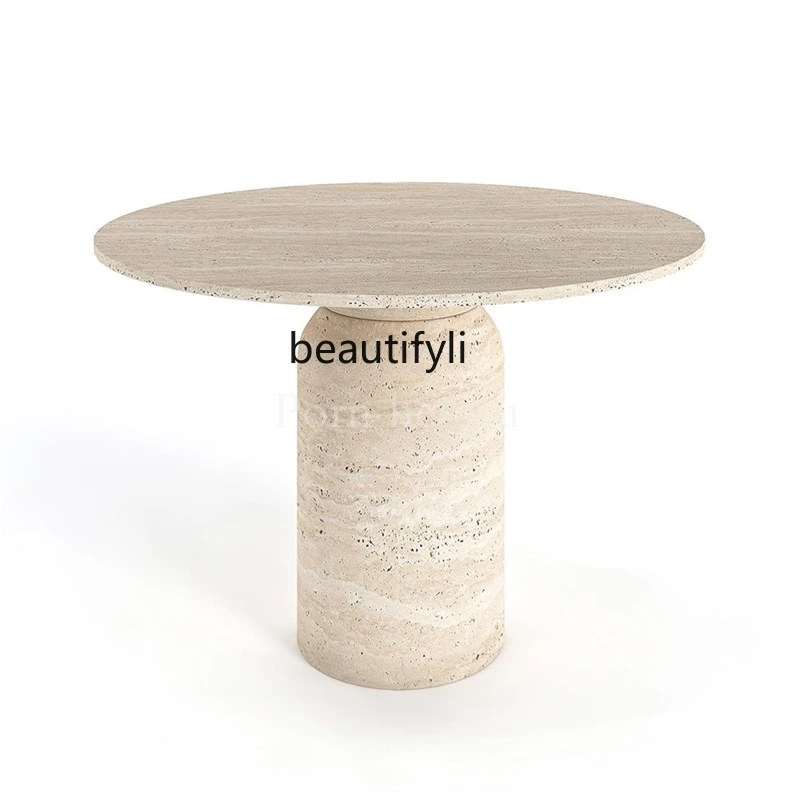 

Nordic natural travertine round dining table designer wabi sandy wind simple marble living room model room