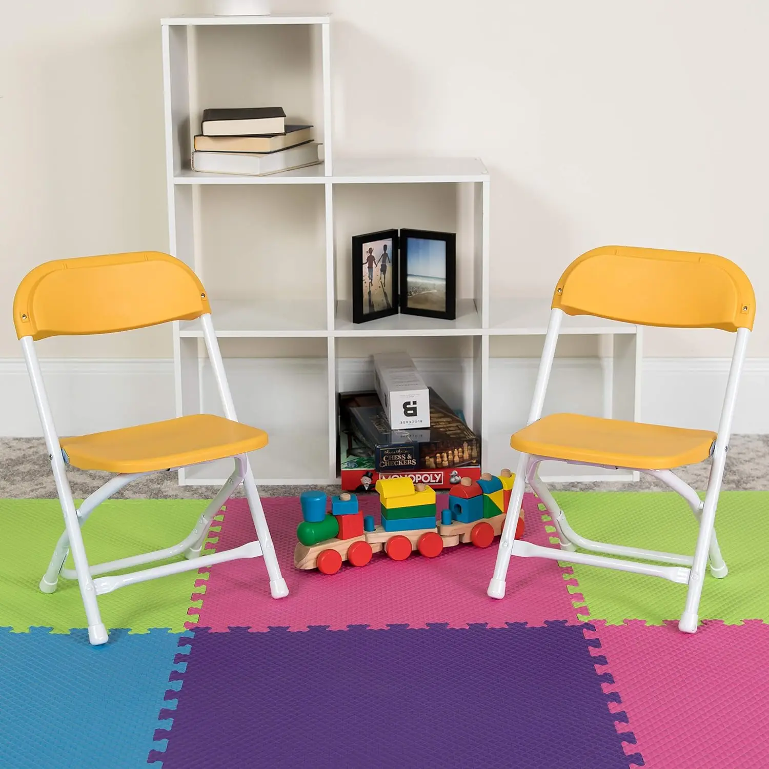 Silla plegable de plástico para niños, adecuada para actividades en el aula