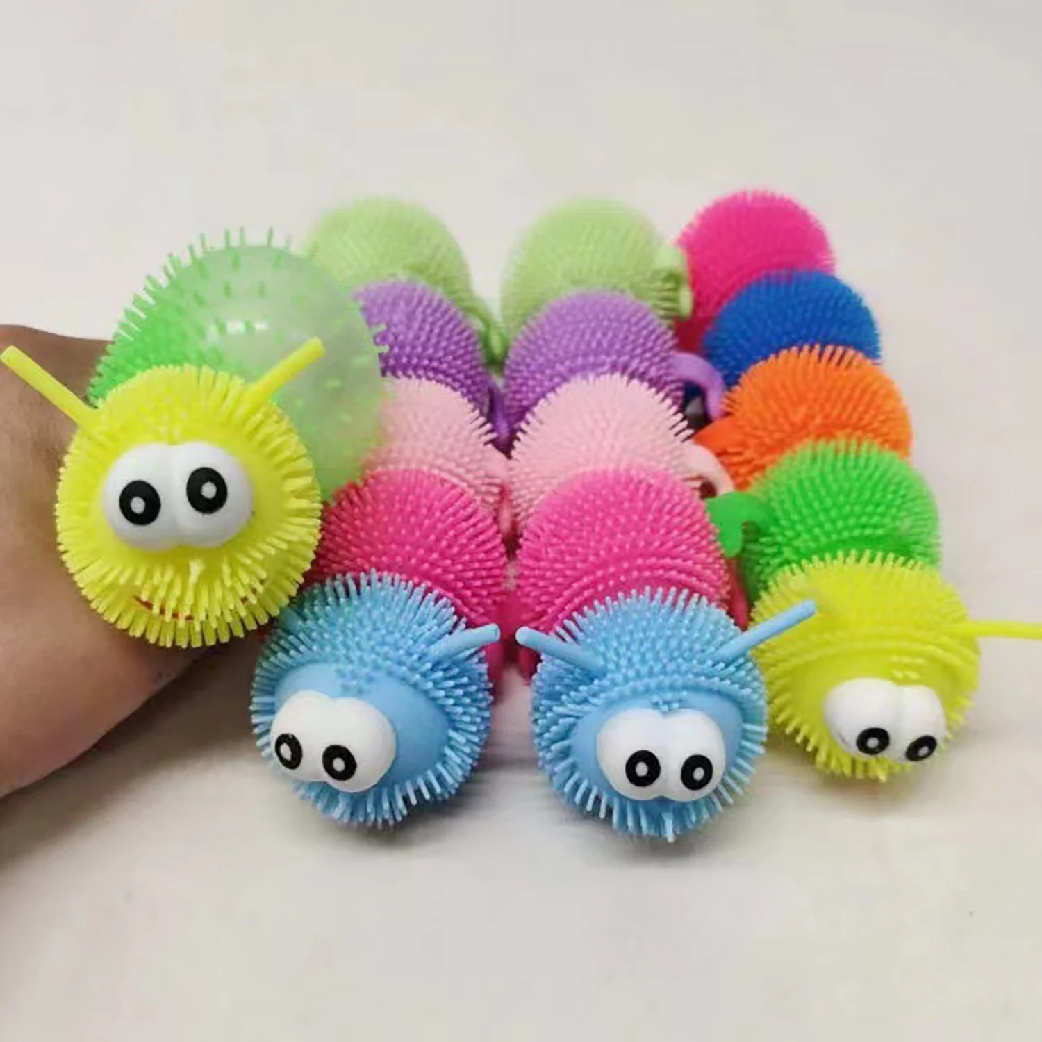 Cartoon eye-catching five section caterpillar squeezing and decompression toy, new and unique with light decompression toy