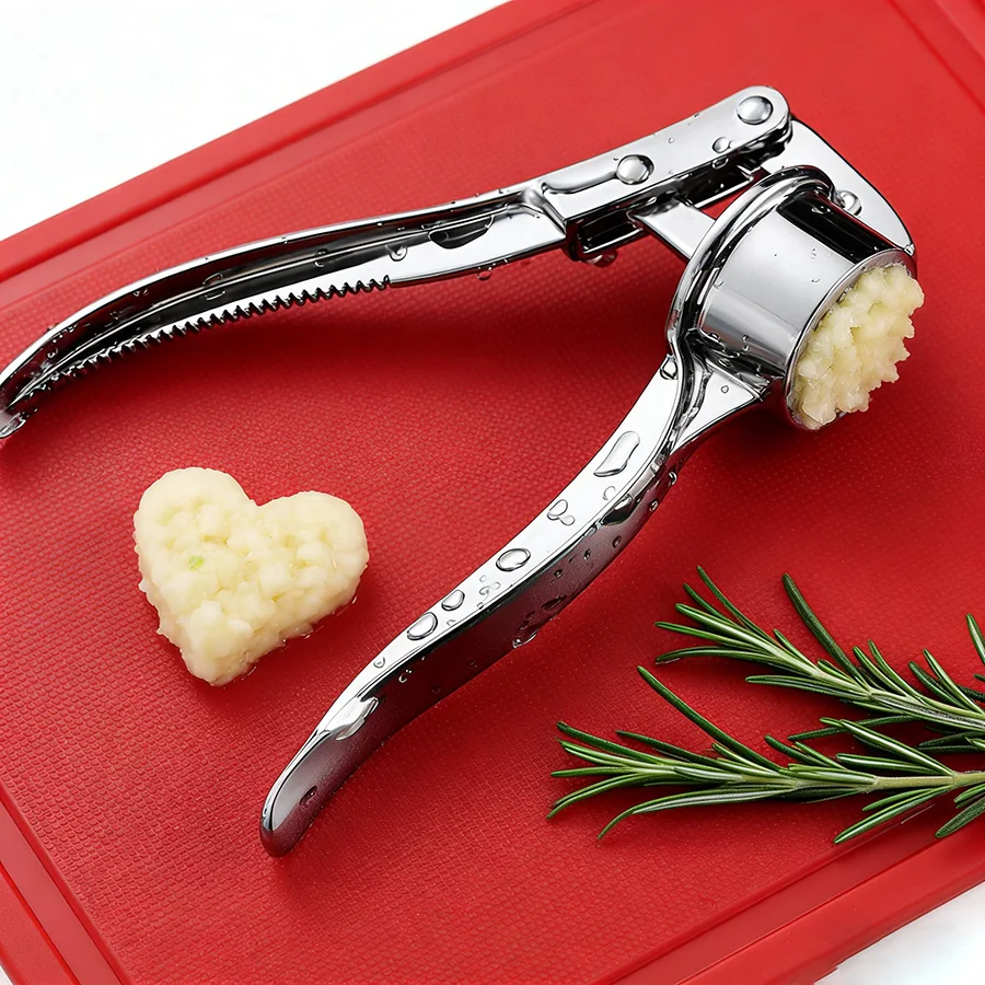 

Multi-Use Stainless Steel Garlic Mincer - Labor-Saving Ginger Grinder for Fast Cooking Prep, Easy Clean & Reuse