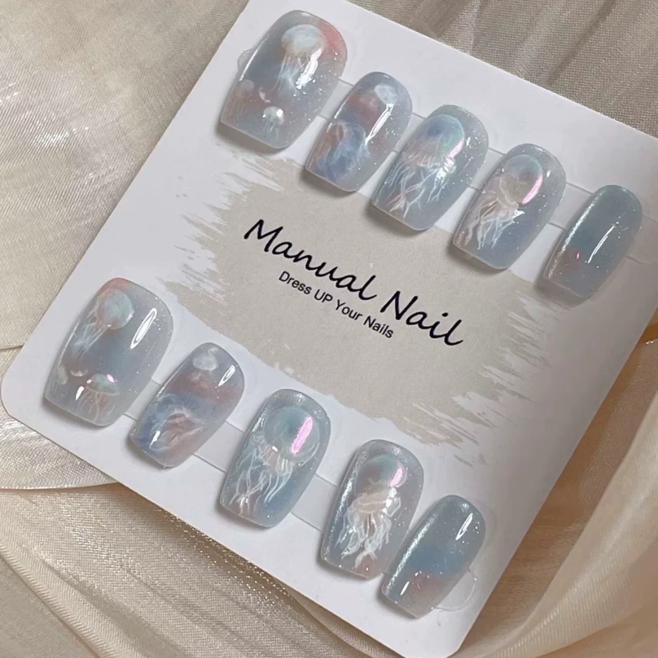 10 ชิ้นผู้หญิงสี Dreamy แมงกะพรุนใหม่ Handmade Cat Eye กดบนเล็บที่ถอดออกได้สวมใส่สาว Art Kawaii สีฟ้าเล็บปลอม