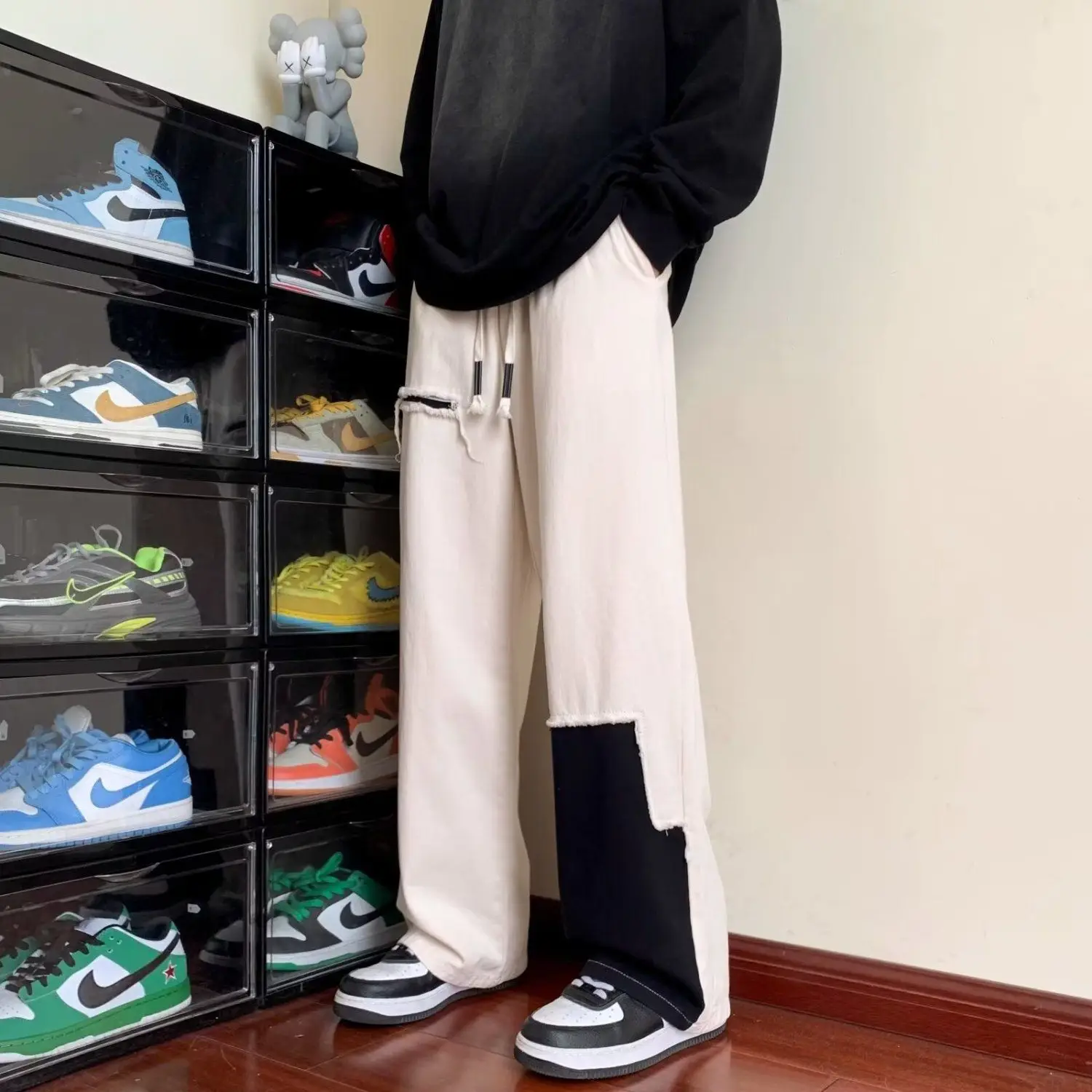 봄과 여름 남성 미국 패션 브랜드 하이 스트리트 인형 스플 라이스 대비 색상 루즈 스트레이트 캐주얼 바지