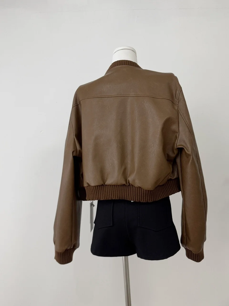 Jaet ort de cuero con cuello de béisbol Retro para mujer, ropa de abrigo adelgazante de cintura alta para motocicleta, Top largo de moda