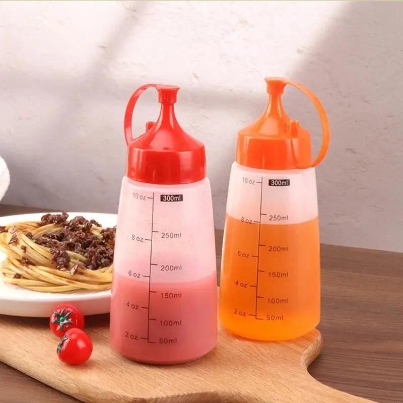 Condiment Squeeze Bottles with Flexible Construction and Narrow Nozzles for Guided Sauce Application During Kitchen Tasks 87HA