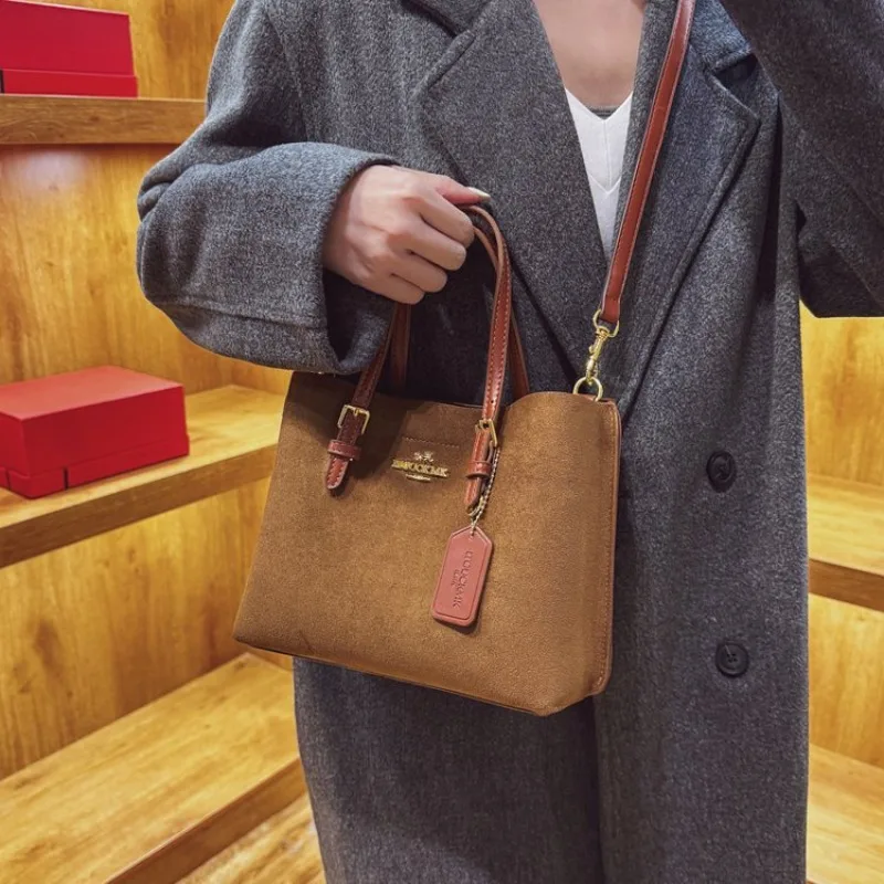 

2026 Весенняя модная женская сумка через плечо с застежкой-молнией идеально подходит для офиса и выходных 3.