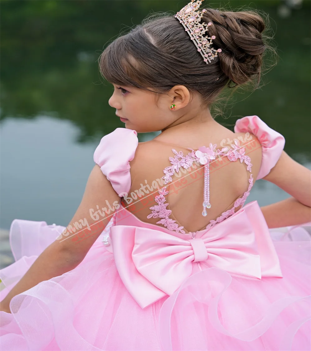 فستان فتاة الزهور الوردي الأنيق لحفلات الزفاف قبل قصير الظهر بفيونكة طويلة مفتوحة من الخلف للحفلات الراقصة الأميرة فستان التواصل الأول