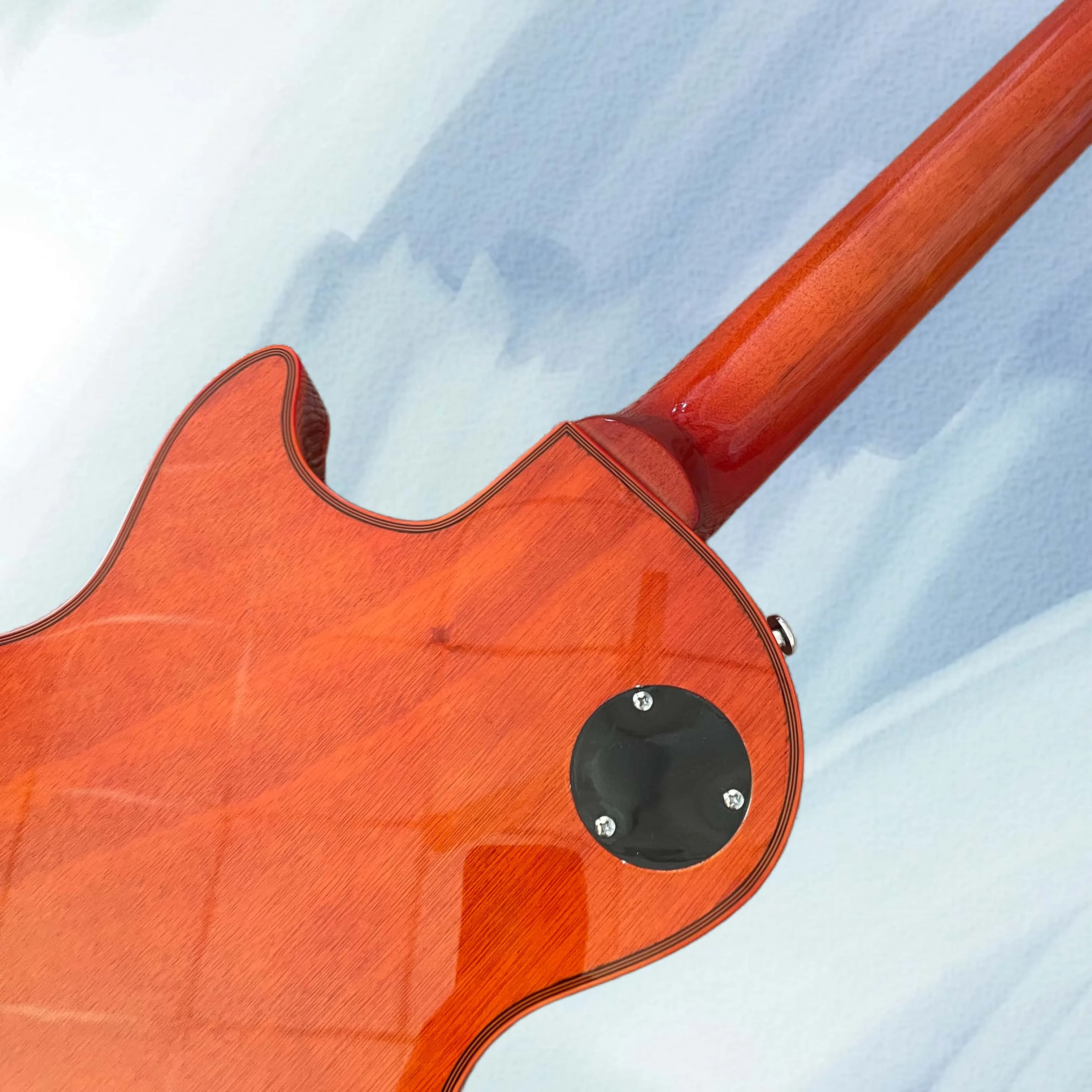 Transparent black electric guitar with red binding, chrome hardware, and a rosewood fingerboard view 4