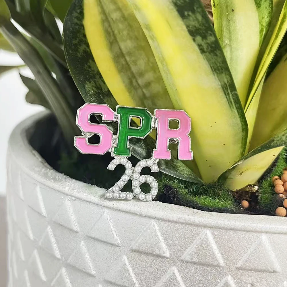 2 broches de perlas SPR 26 de color rosa y verde.