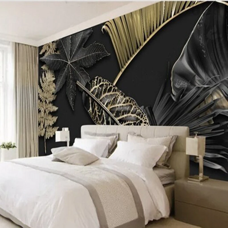 Dinding latar belakang kamar tidur dekorasi rumah mewah bergaya modern minimalis hitam dan emas dengan motif daun besar untuk ruang tamu dan TV