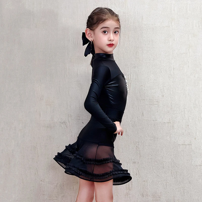2025 Vestito da ballo latino per ragazze maniche lunghe Nero Abbigliamento da competizione Bambini Cha Cha Rumba Costume da ballo latino DNV25001