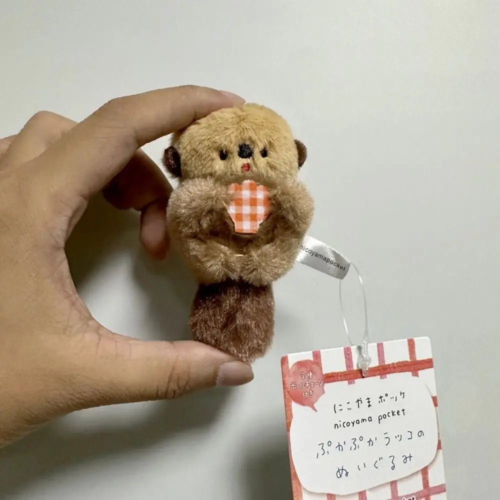 Süße Puppe Otter Halten Shell Schlüsselanhänger koreanischen Stil Plüsch Rucksack Charms Cartoon Schmuckstück Anime Schlüsselanhänger Schlüsselanhänger Ornamente