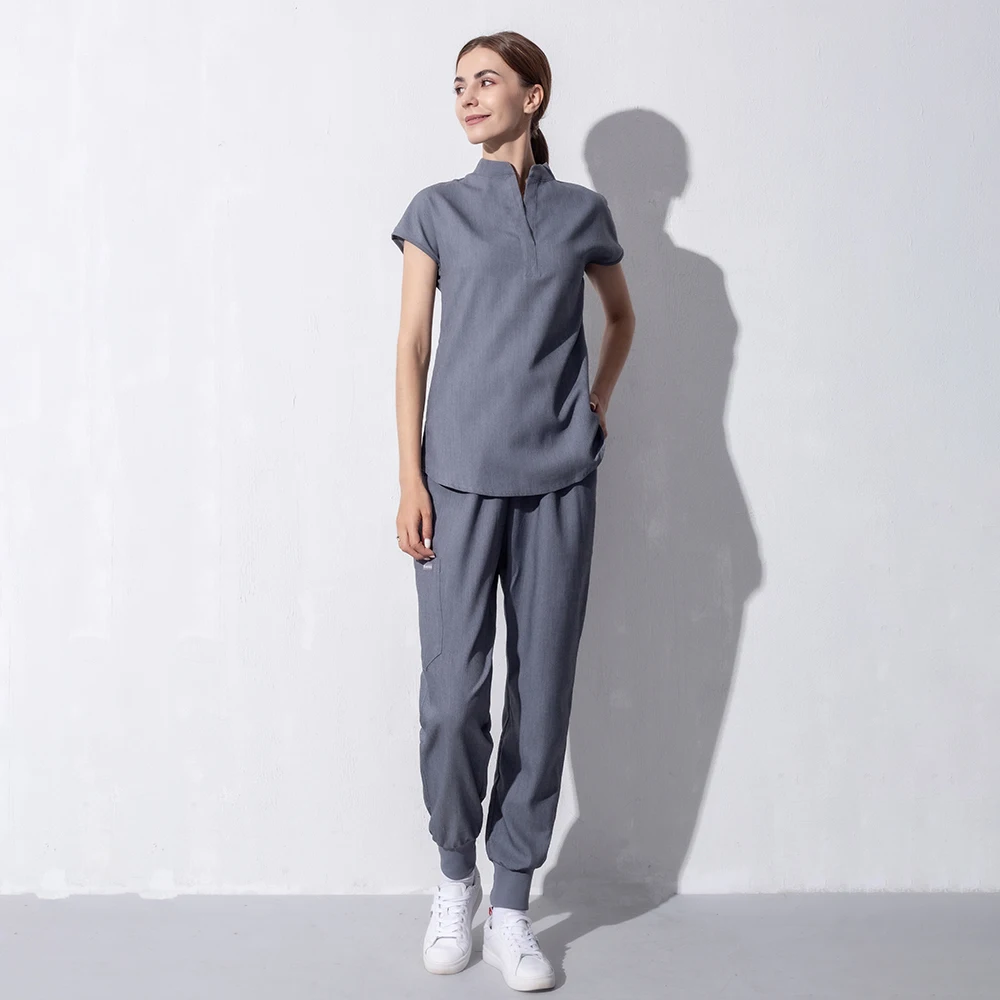 Tinta unita Scrub uniforme infermiera abbigliamento da lavoro Scrub Set Top Pant uniformi infermieristiche donna uomo scollo a v ospedale medico abiti da lavoro