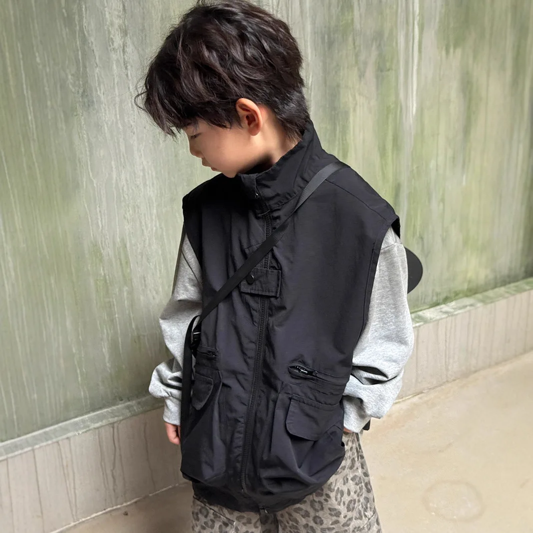 سترة شحن كلاسيكية للأطفال لخريف 2025 موضة كورية جديدة غير رسمية يومية بلون سادة بدون أكمام معطف بياقة واقفة #6