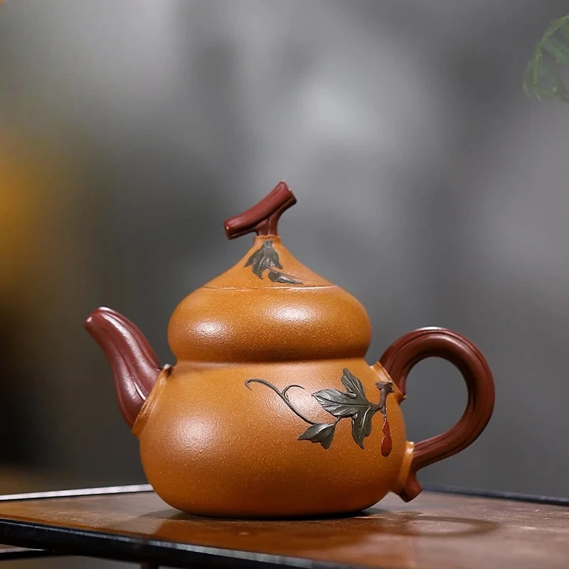 

Чайник из исинской глины ручной работы, с золотым декором, в форме тыквы, набор для чаепития Кунг-фу, чайник в китайском стиле