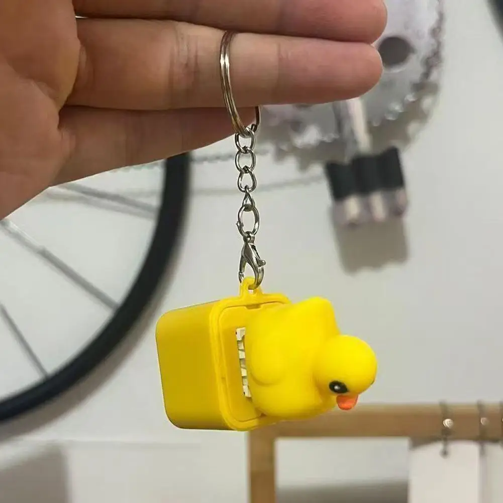 Brinquedo de pato de imprensa com botão, chaveiro de animal com luz LED para brincadeira e diversão, presentes de mordaça de alívio de estresse alimentados por bateria para crianças e adultos